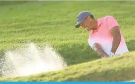  ??  ?? FLORIDA: Tiger Woods plays a shot on the 18th hole during the second round of The Honda Classic at PGA National Resort and Spa on February 23, 2018.— AFP