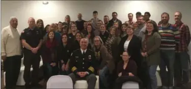  ?? ZACHARY SRNIS — THE MORNING JOURNAL ?? Lorain Police Chief Cel Rivera poses with the current class of Leadership Lorain County.