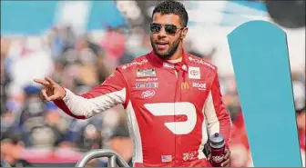  ?? Rick Scuteri / Associated Press ?? Driver Bubba Wallace says the pointed criticism he made toward members of his crew last weekend shouldn’t carry over to this week’s event at Road America. “We have a team capable of winning, cars capable of winning,” Wallace said as he prepared for Sunday’s race in Wisconsin.