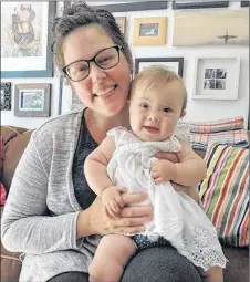  ?? ROSALIE MACEACHERN PHOTO ?? Christine Whelan marvels at how her daughter Izzy’s Down syndrome diagnosis has changed everything and yet nothing at all. Her hope is that she will be loved and have friends, both of which are proving to be easy.