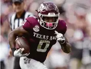  ?? Sam Craft/Associated Press ?? Ainias Smith, a former Dulles High star, capped his Texas A&M career with over 4,000 all-purpose yards.