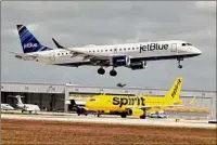  ?? Joe Cavaretta / Tribune News Service ?? Spirit Airlines says antitrust regulators are unlikely to approve Jetblue’s offer because of Jetblue’s alliance with American Airlines in the Northeast, a deal Justice is suing to block.