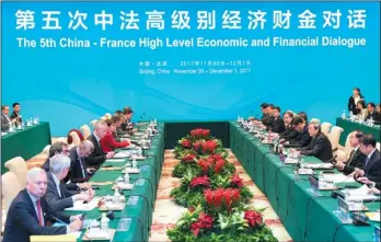  ?? DING HAITAO / XINHUA ?? Chinese and French delegates meet at the fifth China-France High-Level Economic and Financial Dialogue.
