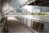  ?? SUN- TIMES FILE PHOTO ?? The Chicago Riverwalk under the Franklin Street bridge.