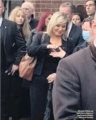  ??  ?? M ichelle O’neill and (left) Gerry Adams at the funeral of Bobby
Storey on Tuesday
