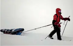  ??  ?? The trek provided the ski tourists with plenty of ‘‘thinking time’’ as they dragged their sleds.