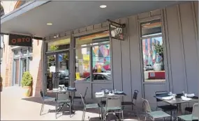  ?? BARBARA HADDOCK TAYLOR/BALTIMORE SUN PHOTOS ?? Orto, an Italian restaurant at 1709 N. Charles Street, has sidewalk seating in front.