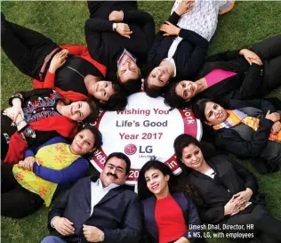  ??  ?? Umesh Dhal, Director, HR & MS, LG, with employees