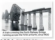  ??  ?? A train crossing the Forth Railway Bridge running across the Firth of Forth, circa 1900