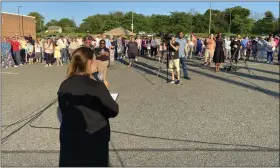  ?? EVAN BRANDT — MEDIANEWS GROUP ?? The Rev. Nichole Jackson speaks to the crowd of several hundred people during a prayer vigil for the victims of the Hale Street home explosion held Sunday at Pottstown High School.