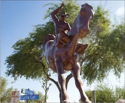  ?? VINCENT OSUNA PHOTO ?? A front angle view of the new Brawley Cattle Call statue after it replaced the former statue just outside of Cattle Call Arena on Friday afternoon in Brawley.