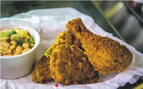  ?? John Storey / Special to the Chronicle 2016 ?? Fried chicken and butter beans is a specialty at Bywater restaurant in Los Gatos.