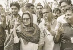  ?? PTI ?? Rashtriya Lok Dal candidate Tabassum Hasan celebrates with her supporters after winning the Kairana Lok Sabha byelection­s, May 31