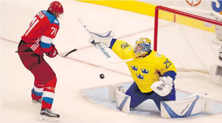  ?? — GETTY IMAGES FILES ?? Canucks goalie Jacob Markstrom made his World Cup mark by backstoppi­ng Sweden to a 2-1 victory in the tournament opener over Russia.