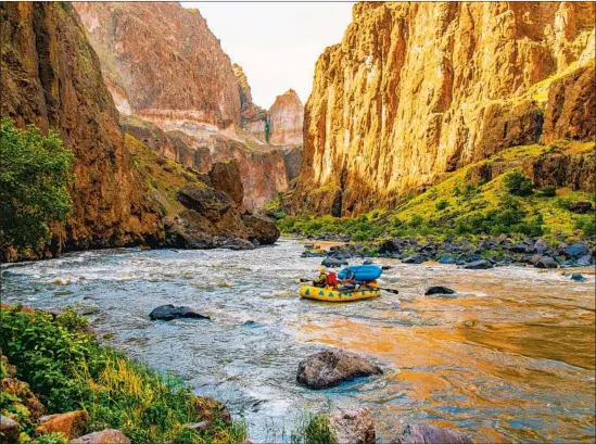  ?? Northwest Rafting Co. ?? THE OWYHEE CANYONLAND­S of eastern Oregon have a snowpack at 125% of average this spring, which should mean good rafting likely through early June.