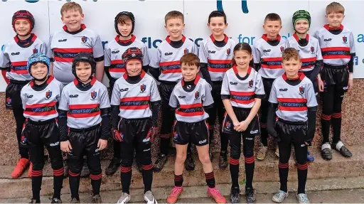  ?? ?? ● The Wids Under 9s wore their new kit sponsored by Merseyflow
●