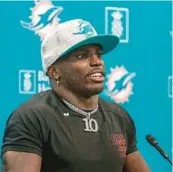  ?? CARL JUSTE/AP ?? Dolphins receiver Tyreek Hill holds his first news conference March 24.