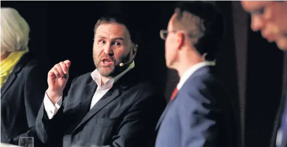  ??  ?? > Siôn Simon exchanges views with Andy Street at the final West Midlands mayor hustings at the weekend. How will the mayor interact with Government?