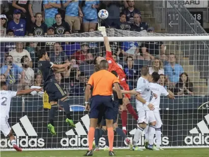  ?? CHICAGO FIRE FC ?? Fire goalkeeper Gaga Slonina punches the ball away during the game Saturday against the Union. He made three saves.