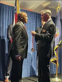  ?? ?? Joseph Daly, right, Delaware County Veterans Memorial Associatio­n President, awards the Freedom Medal of honor to Lt. Gen. Ronald Coleman, U.S. Marine Corps and U.S. Navy veteran. Originally from Darby, Coleman retired in 2009after four decades in the military. In 2016, Darby Borough honored Coleman by renaming a street, “Ronald Coleman Boulevard.”