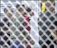  ?? SCOTT MCINTYRE / THE NEW YORK TIMES ?? Esteban Santiago, the man accused of a shooting at the Ft. Lauderdale airport, is escorted into Broward County Jail.
