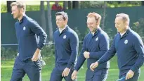  ?? Picture / AP ?? Europe players, from left, Chris Woods, Rory McIlroy, Andy Sullivan and Sergio Garcia during practice yesterday.