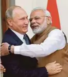  ?? EPA PIC ?? Indian Prime Minister Narendra Modi hugging Russian President Vladimir Putin in New Delhi yesterday.