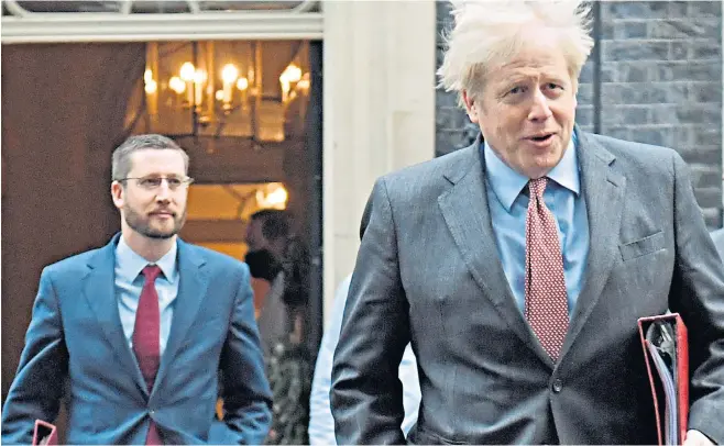  ?? ?? Simon Case, far left, is on to his third prime minister, having been appointed as the youngest ever Cabinet Secretary by Boris Johnson, in September 2020