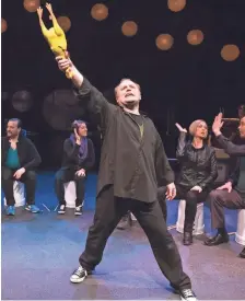  ?? MARK FROHNA ?? MOT’s revival of “The Mikado” returns nearly all of the 2015 cast members, including Jason Powell (standing) and the rubber chicken.