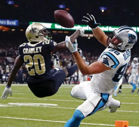  ?? BUTCH DILL/THE ASSOCIATED PRESS ?? New Orleans Saints cornerback Ken Crawley breaks up a pass in the end zone intended for Carolina Panthers tight end Greg Olsen on Sunday.