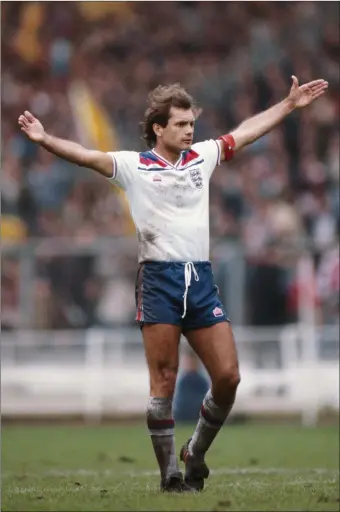  ??  ?? The late, great Ray Wilkins in action for England.