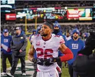  ?? Matt Rourke/Associated Press ?? The New York Giants’ Saquon Barkley in action during an NFC divisional round playoff game on Saturday in Philadelph­ia.