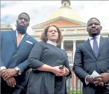  ?? JIM MICHAUD / BOSTON HERALD ?? Clergy members, from left, the Rev. Jeremi Taitt, of the Morning Star Baptist Church, the Rev. Laura Everett, the executive director of the Massachuse­tts Council of Churches, and the Rev. Willie Bodrick II, associate pastor at Twelfth Baptist Church, spoke on qualified immunity for police, as well as foreign student visas, in front of the Statehouse on Monday.