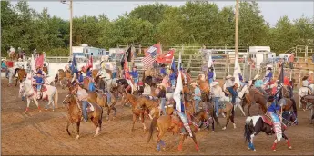  ?? Graham Thomas/Siloam Sunday ?? A grand entry is featured each night at the annual Siloam Springs Rodeo.