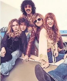  ?? PAMELA LITTKY PRIME VIDEO ?? The buzzy new series “Daisy Jones and the Six,” starring Riley Keogh, right, as the titular character, has kicked off a ‘70s style craze.