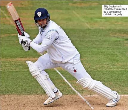  ??  ?? Billy Godleman’s resistence was ended by a spectacula­r catch in the gully.