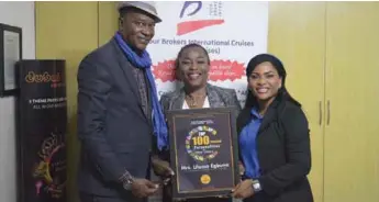  ??  ?? L-R : Organiser of Akwaaba, Mr. Ikechi Uko, Mrs. Uloma Egbuna of Tour Brokers Internatio­nal Limited with her award
