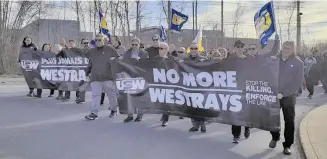 ?? ?? On May 9, dozens of people marched along Park Street in New Glasgow to mark the 30th anniversar­y of the Westray Mine Disaster. Twenty-six miners died in the explosion at the Pictou County mine.