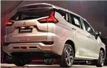  ??  ?? MITSUBISHI officials from the Philippine­s and the car maker’s Tokyo headquarte­rs present the Xpander. From left are Mitsubishi Motors Philippine­s Corporatio­n (MMPC) First Vice-President for Vehicle Sales and Marketing Froilan G. Dytianquin; Mitsubishi...