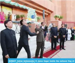  ??  ?? KUWAIT: Indian Ambassador K Jeeva Sagar hoists the national flag of India.— Photos by Yasser Al-Zayyat