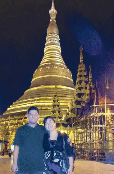  ??  ?? The author Tim Tam Ong at the Shwedagon Pagoda with husband Michael Ong who is half-Burmese