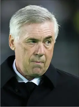  ?? MANU FERNANDEZ — THE ASSOCIATED PRESS ?? Real Madrid head coach Carlo Ancelotti looks on before the FIFA Club World Cup semifinal match Wednesday between Al Ahly and Real Madrid.