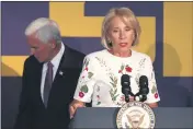  ?? GERALD HERBERT — THE ASSOCIATED PRESS ?? Education Secretary Betsy DeVos speaks at a press conference with Vice President Mike Pence in Tiger Stadium on the Louisiana State University campus in Baton Rouge, La.