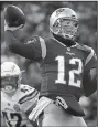  ?? AP/ELISE AMENDOLA ?? New England Patriots quarterbac­k Tom Brady finished 34 of 44 for 343 yards and a touchdown in the Patriots’ 41-28 victory Sunday.