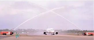  ??  ?? Srilankan’s first A320neo aircraft being welcomed at Bandaranai­ke Internatio­nal Airport with a traditiona­l water canon salute PIC BY PRADEEP PATHIRANA