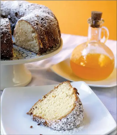  ?? Food styling/KELLY BRANT Arkansas Democrat-Gazette/THOMAS METTHE ?? Citrus Chiffon Cake is delicious with a simple dusting of confection­ers’ sugar, but is even better with a drizzle of Citrus Syrup.