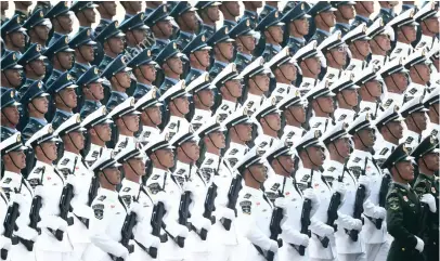  ?? (Xinhua/Xing Guangli) ?? A formation of reserve forces takes part in a grand military parade.