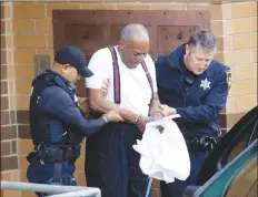  ?? AP PHOTO ?? Bill Cosby is escorted out of the Montgomery County Correction­al Facility, Tuesday Sept. 25, 2018, in Eagleville, Pa., following his sentencing to three-to10-year prison sentence for sexual assault.