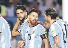  ?? — Reuters photo ?? Argentina’s Lionel Messi (centre) and teammates during the qualifying match against Chile, in this March 23 file photo.