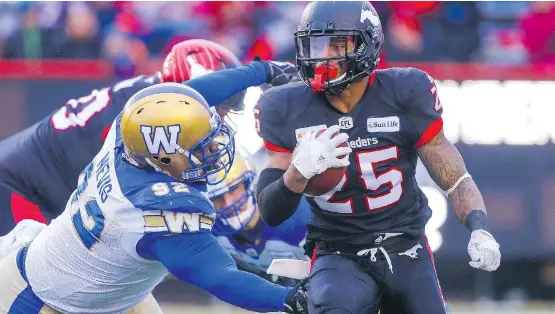  ?? AL CHAREST ?? Don Jackson had an efficient day running the football for the Stampeders in Sunday’s West final against the Winnipeg Blue Bombers, allowing the Stamps to maintain ball control.